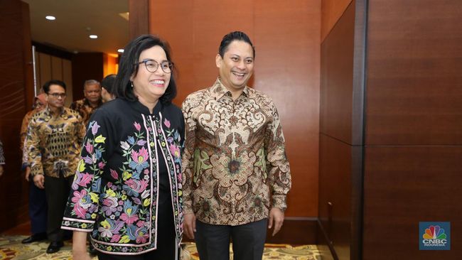 sri-mulyani-cs-hadiri-makan-siang-terakhir-kabinet-jokowi-di-istana_d95d7d9.jpg