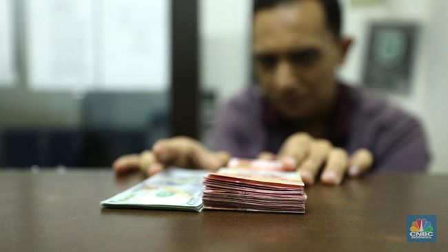 the-fed-rilis-risalah-rapat-dolar-menguat-sentuh-rp16-200_9518a37.jpg